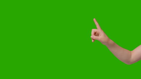 Close-Up-Of-Child-Making-Online-Scrolling-Gesture-Against-Green-Screen